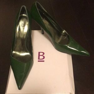 Green pointed toe heels.
